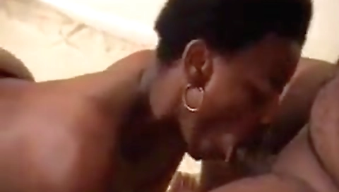 Granny in a thong giving head
